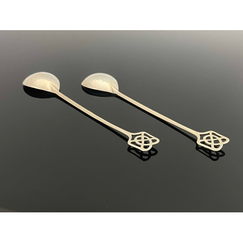 147 - Keswick School of Industrial Arts, a pair of Arts and Crafts silver spoons, Chester 1930, the pear s... 