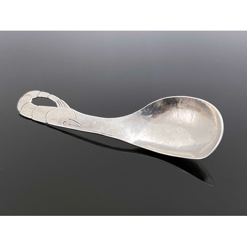 153 - An Arts and Crafts silver spoon, Enid Kelsey, London 1936, the handle in the form of a shrimp, plani... 