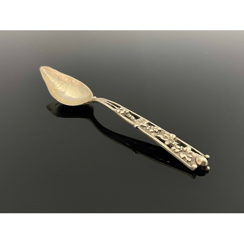 154 - Amy Sandheim, an Arts and Crafts silver grapefruit spoon, London 1926, the pointed planished bowl, o... 