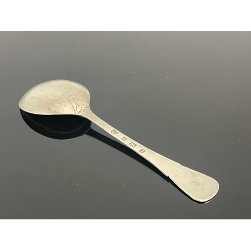 162 - An Arts and Crafts silver spoon, George Hunt, Birmingham 1933, planished, in the Iona style, engrave... 