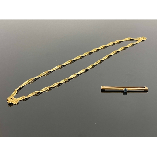 178 - A 9ct gold chain, together with a 9ct gold and sapphire tie pin, 7.1g (2)