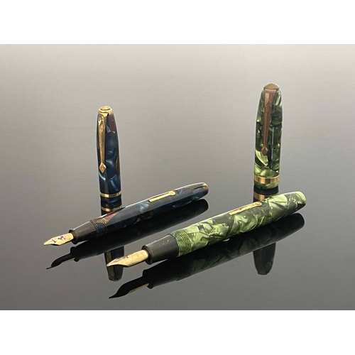 195 - Conway Stewart, a number 84 fountain pen and a Dinkie 550 fountain pen, each with 14 carat gold nibs... 