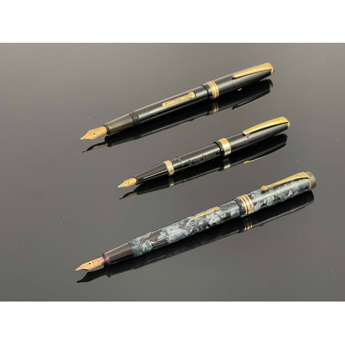 196 - Conway Stewart, a 388 fountain pen, blue silver marbled, a 68 black fountain pen and an Onoto lever ... 