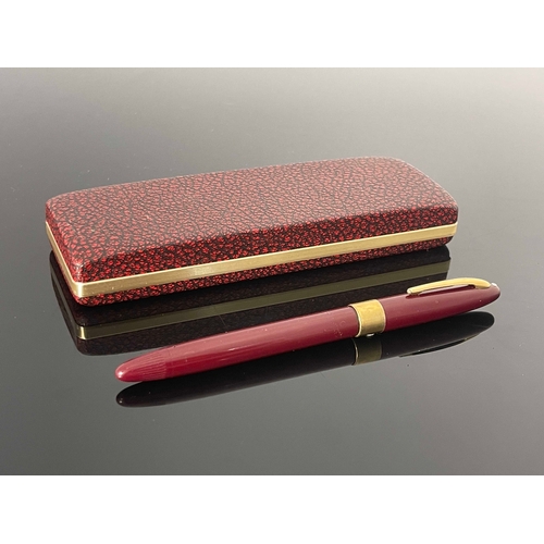 198 - Sheaffer, a Statesman Snorkel fountain pen, red burgundy with gold trim and 14 carat gold nib, in or... 