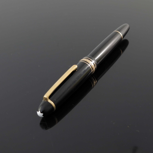 199 - Montblanc, a Meisterstick LeGrand 162 rollerball pen, in leather two pen pouch, gold trim