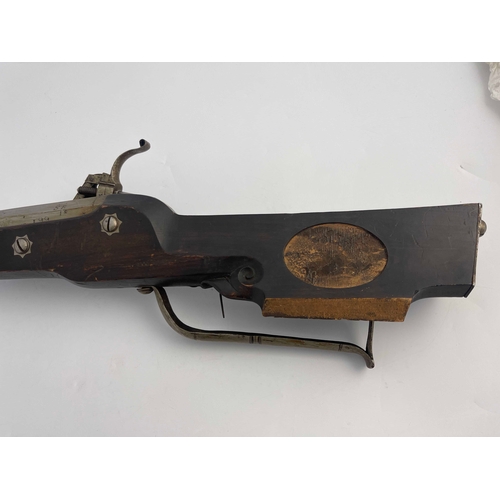 206 - A late 17th/early 18th century German wheel lock rifle, 74 inch octagonal sighted barrel, barrel wit... 