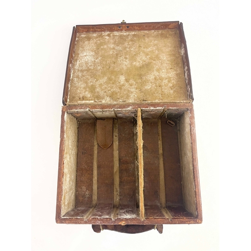 213 - A late 19th/early 20th century leather bound gun case, Bofs & Co London, the carcass covered in tool... 