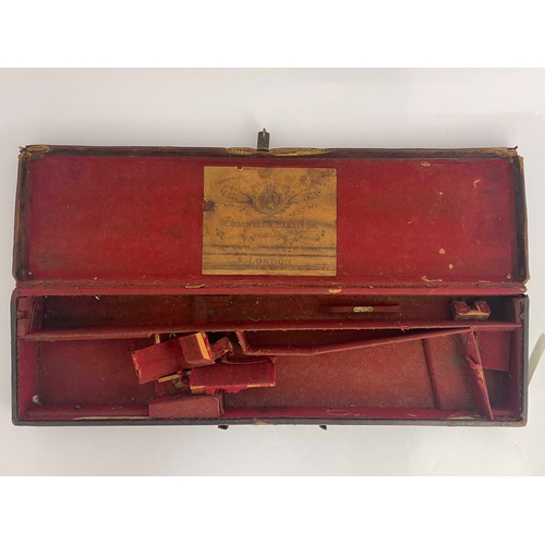 216 - A late 19th/early 20th century leather bound gun case, Cogswell & Harrison, the carcass covered in t... 