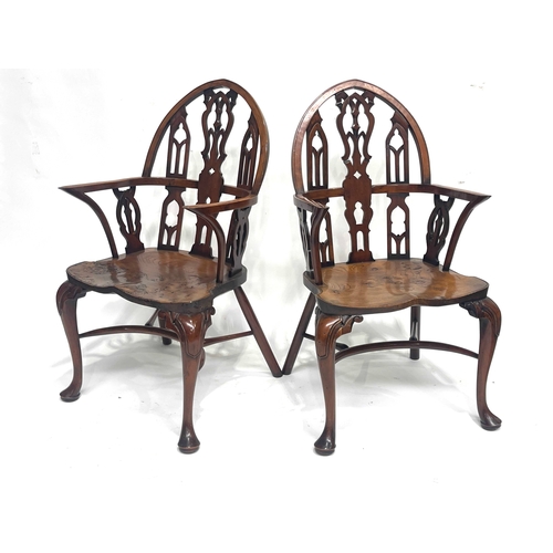 233 - Stuart Linford, a bespoke set of eight burr elm dining chairs, (two carvers), Gothic arched backs wi... 