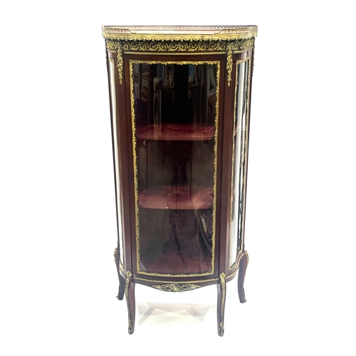 244 - A mahogany vitrine of Louis XVI design, early 20th Century, of bowfront from, pink veined marble top... 