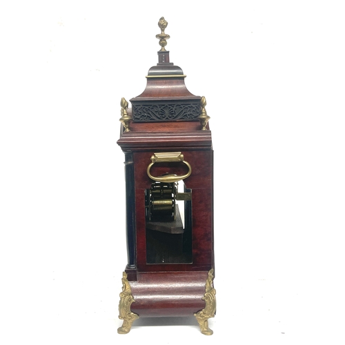 261 - Spencer & Perkins, London, a George III mahogany bracket clock, caddy top with brass flame finials, ... 