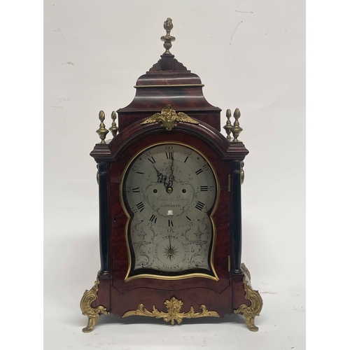 261 - Spencer & Perkins, London, a George III mahogany bracket clock, caddy top with brass flame finials, ... 