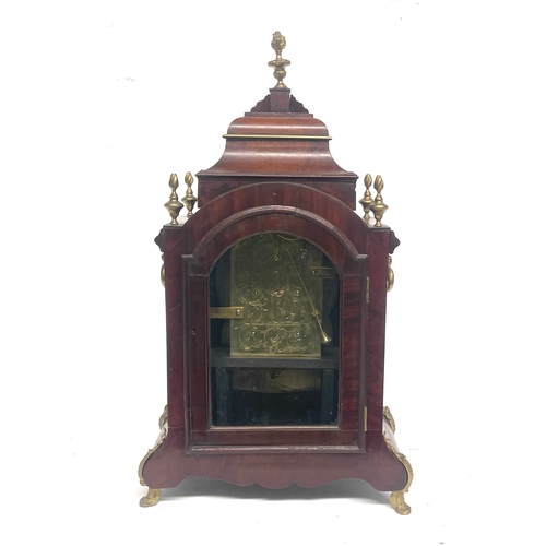 261 - Spencer & Perkins, London, a George III mahogany bracket clock, caddy top with brass flame finials, ... 