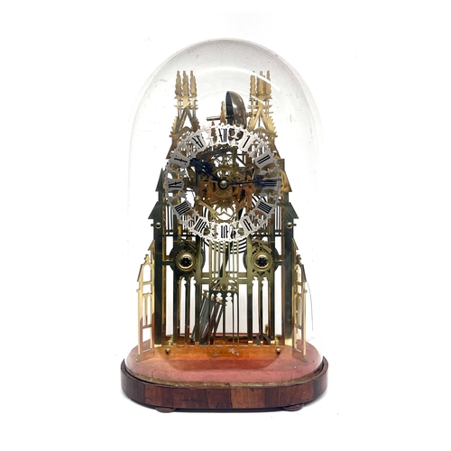 262 - A 19th Century brass skeleton clock, of Gothic cathedral form, silvered chapter ring, double fusee m... 