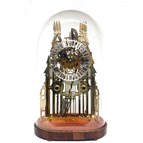 262 - A 19th Century brass skeleton clock, of Gothic cathedral form, silvered chapter ring, double fusee m... 