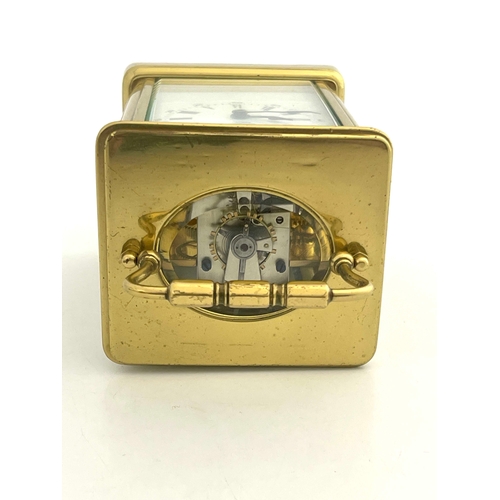 268 - Alfred Drocourt, a French gilt brass carriage clock, jewelled lever escapement, white enamelled dial... 