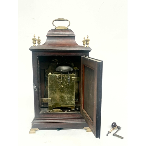 271 - William Beavington, Stourbridge, a George III mahogany bracket clock, caddy top with brass swing han... 