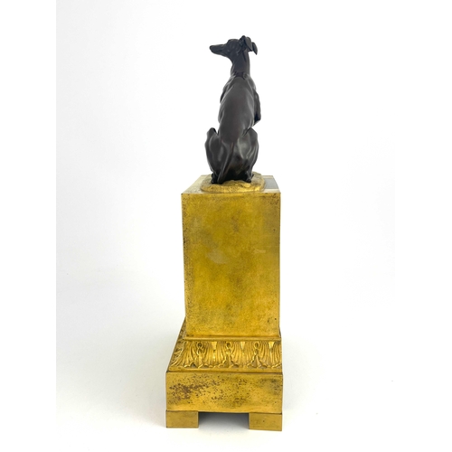 275 - A French ormolu bracket clock, circa 1870, surmounted with a bronze model of a seated greyhound, whi... 