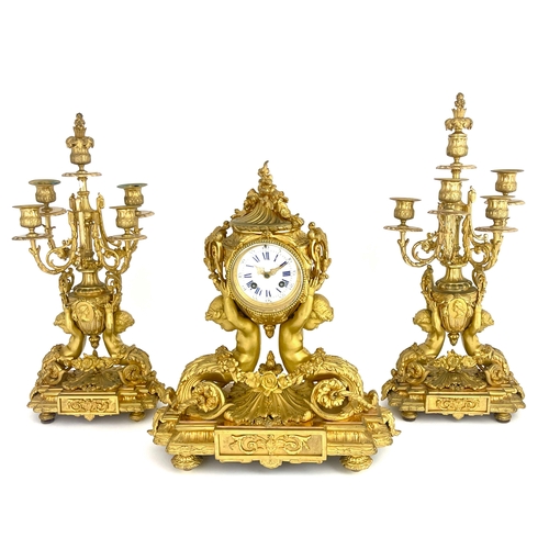 276 - A 19th Century French gilt ormolu clock garniture, circa 1870, of Baroque design incorporating a pai... 