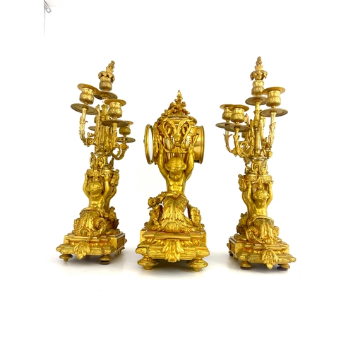 276 - A 19th Century French gilt ormolu clock garniture, circa 1870, of Baroque design incorporating a pai... 