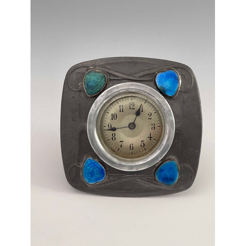 278 - Archibald Knox for Liberty and Co., a Tudric Arts and Crafts pewter and enamelled clock, model 0482,... 