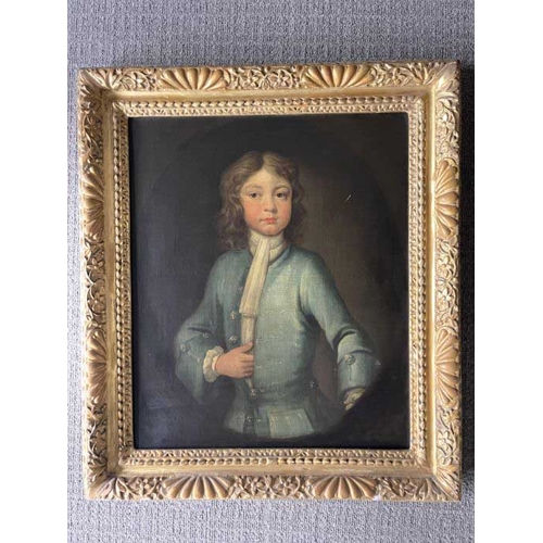 348 - Circle of Charles D'Agar (British, 1669-1723), portrait of a boy, half length in a blue coat, painte... 