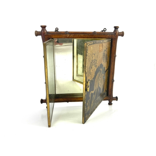 449 - A Japanese folding mirror, bamboo effect frame, the cover with cranes and foliage