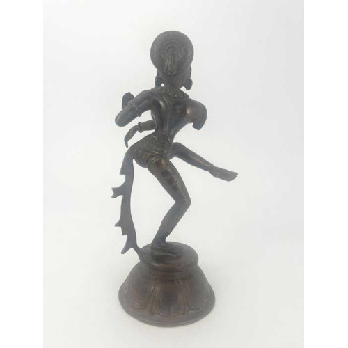 453 - A cast bronze figure of an Indian Hindu goddess Shira, modelled dancing, on cast circular base with ... 