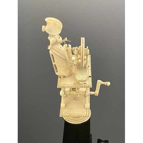 460 - A Napoleonic prisoner of war mechanical bone model, circa 1815, in the form of a Regency woman at a ... 