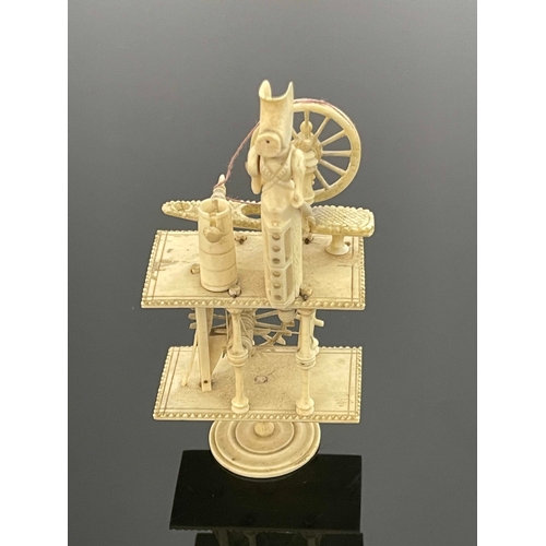 460 - A Napoleonic prisoner of war mechanical bone model, circa 1815, in the form of a Regency woman at a ... 