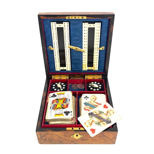 467 - A Victorian figured walnut and Ashford Marble games box, retailed by Wedgwood & Sons, 9 Cornhill, pl... 