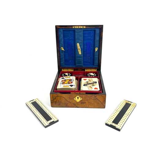 467 - A Victorian figured walnut and Ashford Marble games box, retailed by Wedgwood & Sons, 9 Cornhill, pl... 