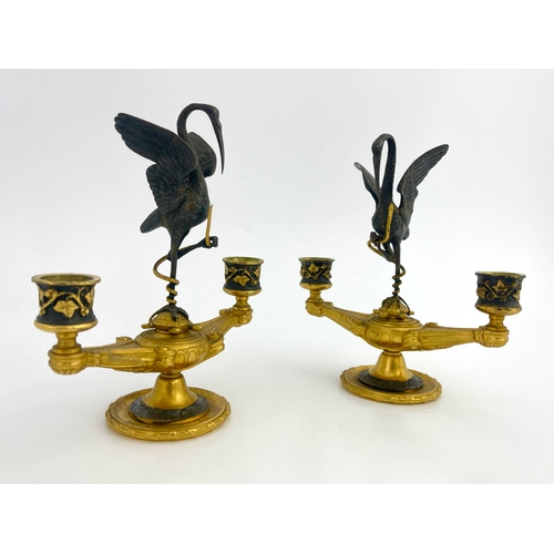 473 - Ferdinand Barbedienne, a pair of bronze and ormolu figural candelabra, modelled as twin sconced Roma... 