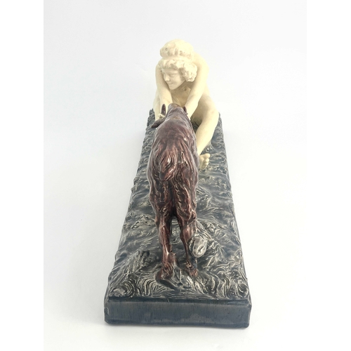 474 - Fortunato Gory (Italian, 1886-1925), ceramic sculpture of a woman with a goat, 43cm long