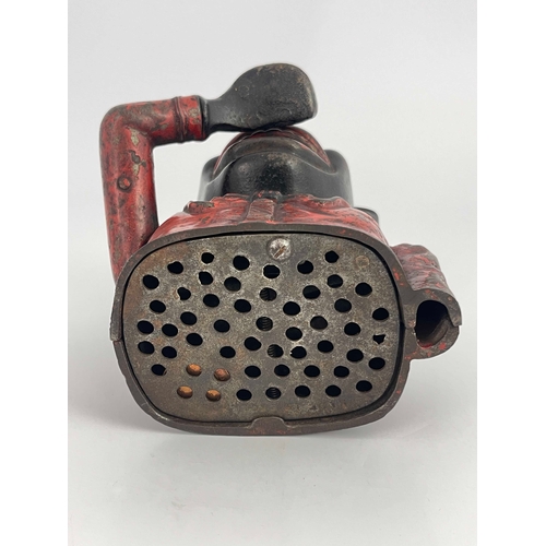 485 - A cast iron mechanical money bank, John Harper & Co, circa 1900, modelled as black man with red jack... 