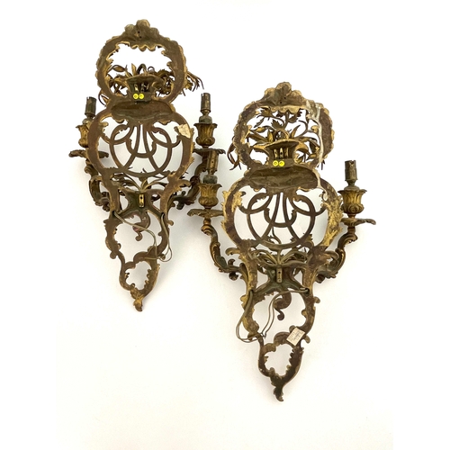 490 - A pair French gilt ormolu double branch wall sconces, 19th Century, of openwork Rococo Revival desig... 