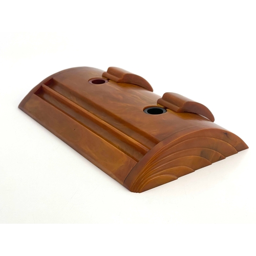 504 - Charles Boyton for Carvercraft, an Art Deco Bakelite double inkwell, 1940's, domed form with two sli... 