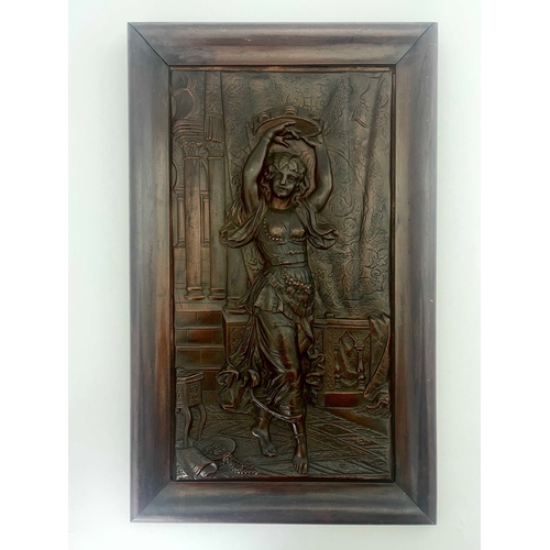 512 - A relief panel of Salome, circa 1900, modelled dancing with tambourine, 50cm x 27cm, framed