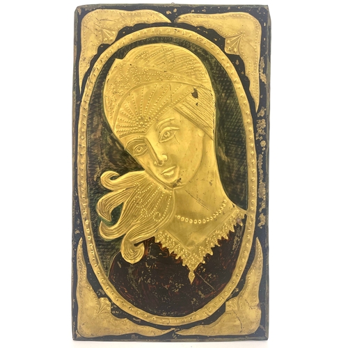 513 - A repousse embossed panel of a woman's head, in the Art Deco style, painted and gilded, 48.5cm x 28.... 