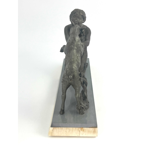 515 - Pierrre Sega (attributed), an Art Deco patinated art metal figure, modelled as a woman feeding a goa... 