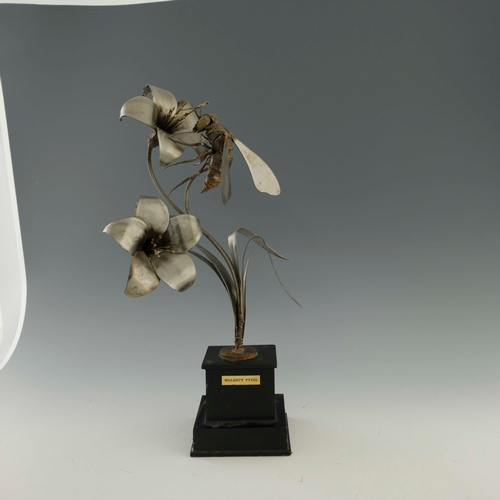 519 - Walenty Pytel (Polish, b.1941), a welded metal sculpture of a bee/wasp and flowers, on stepped base,... 