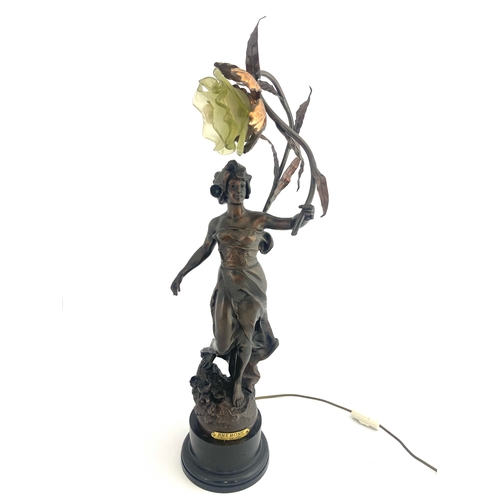 520 - Rousseau, Anemone, an Art Nouveau patinated art metal figural lamp, modelled as a maiden holding a r... 