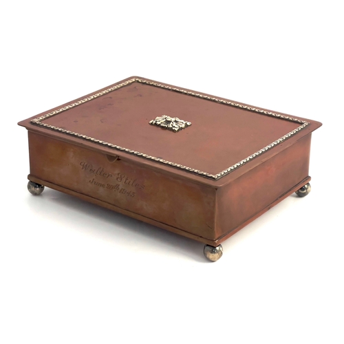 525 - A E Jones, an Arts and Crafts copper and silver overlay box, cuboid form with hinged lid, overlaid w... 