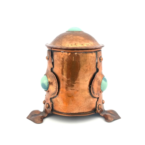 529 - An Arts and Crafts copper and Ruskin cabochon tea caddy, in the style of the Birmingham Guild, cylin... 