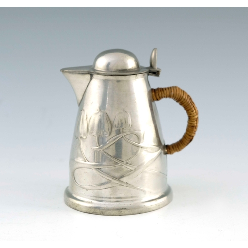 534 - Archibald Knox for Liberty and Co., a Tudric Arts and Crafts pewter hot water jug, model 0958, domed... 