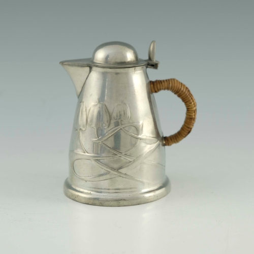 534 - Archibald Knox for Liberty and Co., a Tudric Arts and Crafts pewter hot water jug, model 0958, domed... 