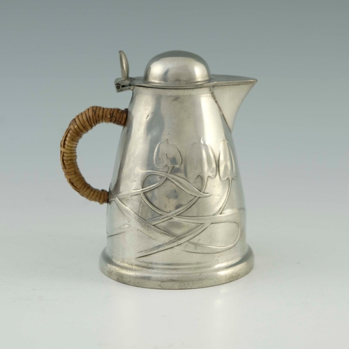 534 - Archibald Knox for Liberty and Co., a Tudric Arts and Crafts pewter hot water jug, model 0958, domed... 