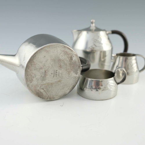 535 - Archibald Knox for Liberty and Co., a Tudric Arts and Crafts pewter four piece tea set, model 0374, ... 