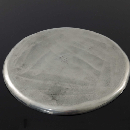 537 - Archibald Knox for Liberty and Co., a Tudric Arts and Crafts pewter tray, model 0163, circular, cast... 