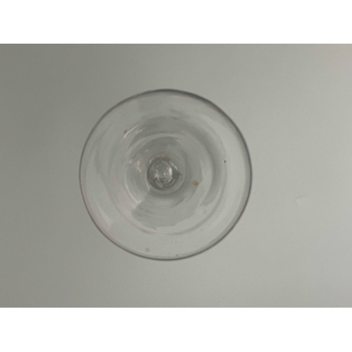 559 - An opaque twist wine glass, circa 1755, the large round funnel bowl on a double series, two strand s... 